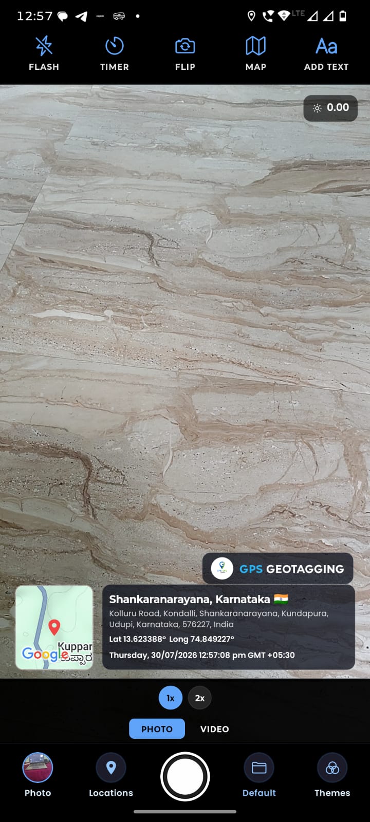 Camera view capturing a photo with live GPS coordinates, map thumbnail and timestamp stamped on in real time